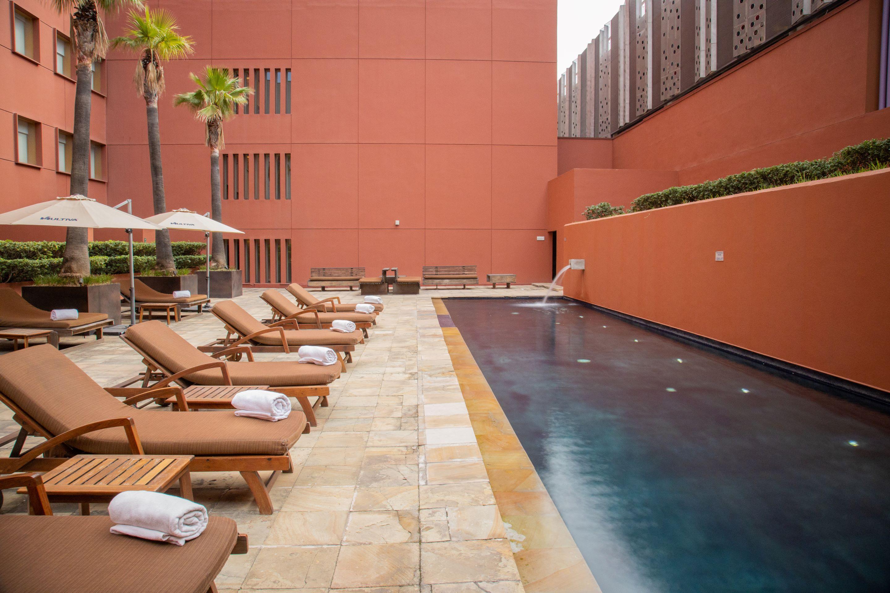 Hotel Camino Real Monterrey San Pedro Garza Garcia Esterno foto The pool at the hotel